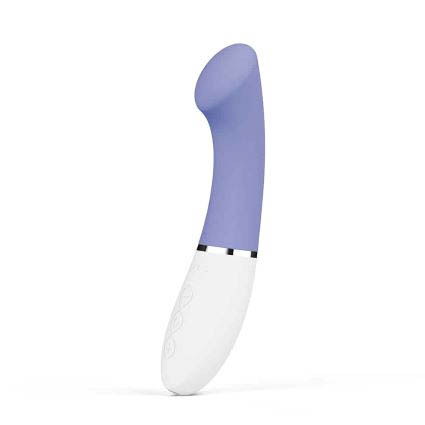 Vibrador curvado de silicona en color lila con base blanca y diseño ergonómico.